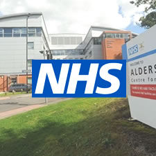 Image of The Aldershot Centre for Health (Exterior) and the NHS logo